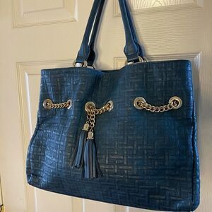 Big Buddha dark blue tote /shoulder bag with gold tone chain accent .
